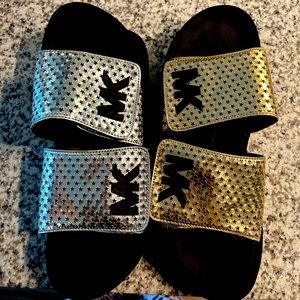 Micheal Kor slides